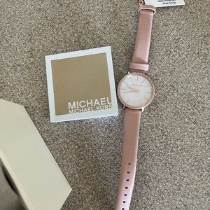 NWT Michael Kors women’s watch.